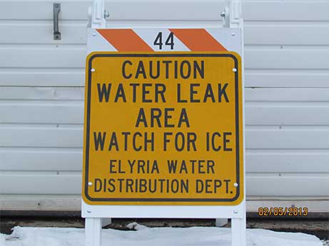 caution water leak sign